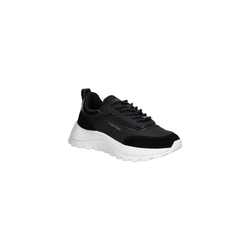 Sneakers by Calvin Klein for women in leather black presents a sumptuous silhouette from the Women's Athletic Casual Leather Sneakers collection, showcasing a sumptuous athletic casual style for an elevated aesthetic.