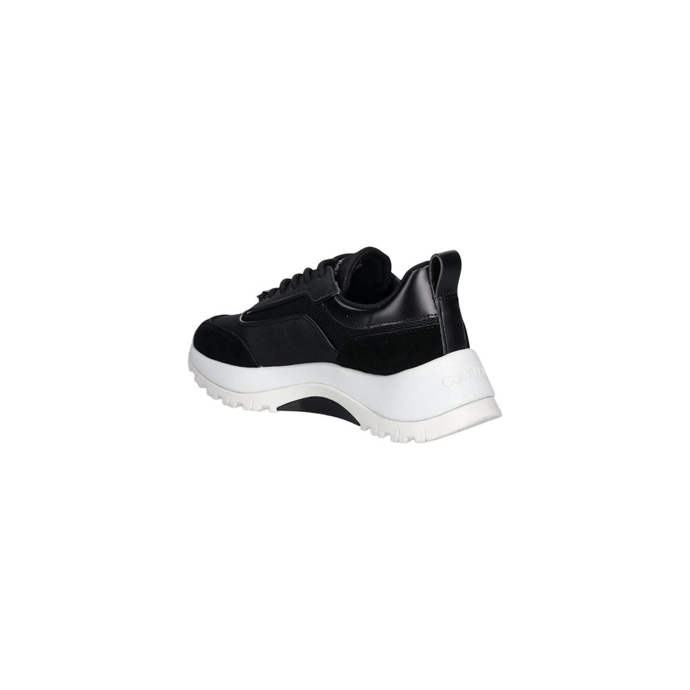 Sneakers by Calvin Klein for women in leather black features an sumptuous silhouette, showcasing the premium Women's Athletic Casual Leather Sneakers in a sumptuous athletic casual style that offers a sumptuous finish for refined style.