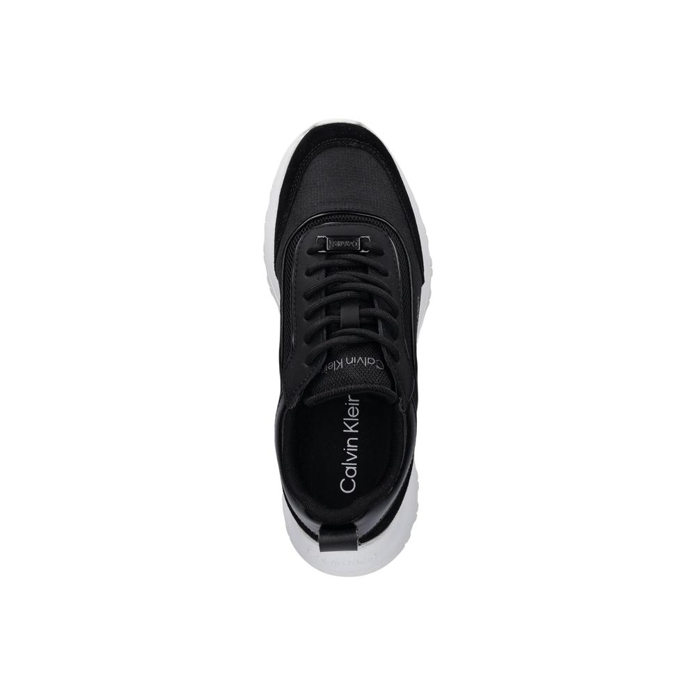 Sneakers by Calvin Klein for women in leather black features an opulent silhouette from the Women's Athletic Casual Leather Sneakers collection, showcasing a signature athletic casual style with an opulent finish.