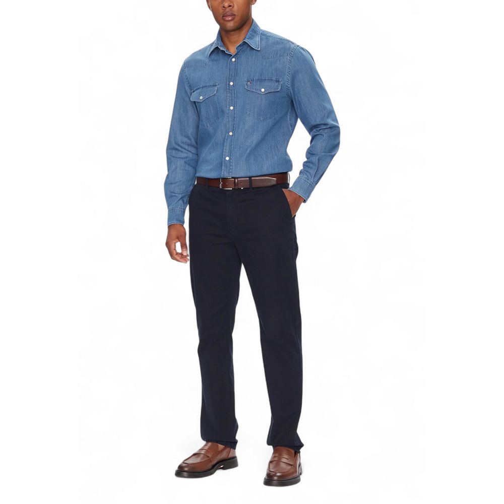 Shirt by Tommy Hilfiger for men in denim cotton light-blue showcases a sharp silhouette, elegantly detailed with a sharp and sharp .