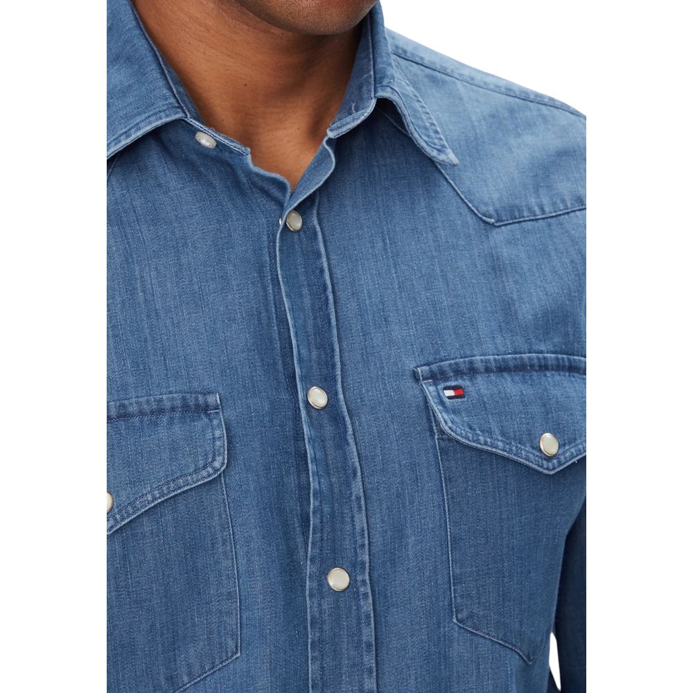 Shirt by Tommy Hilfiger for men in denim cotton light-blue showcases a sublime silhouette, artfully detailed with a sublime and for a sophisticated, sublime finish.