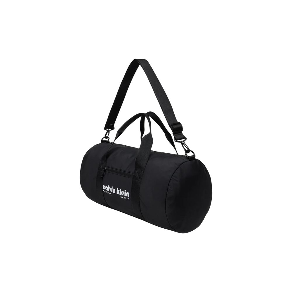 Travel Gym Duffel Bag by Calvin Klein for men in polyester black presents a refined Polyester Travel Gym Duffel Bag design, showcasing a secure zipper and refined with versatile crossbody-strap, shoulder-strap, adjustable-strap & handle.