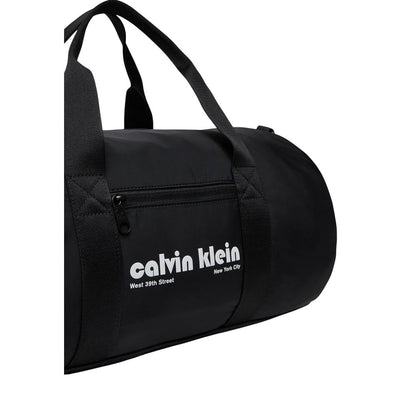 Travel Gym Duffel Bag by Calvin Klein for men in polyester black presents a refined silhouette from the Polyester Travel Gym Duffel Bag collection, featuring a refined zipper, ample , and versatile crossbody-strap, shoulder-strap, adjustable-strap & handle.