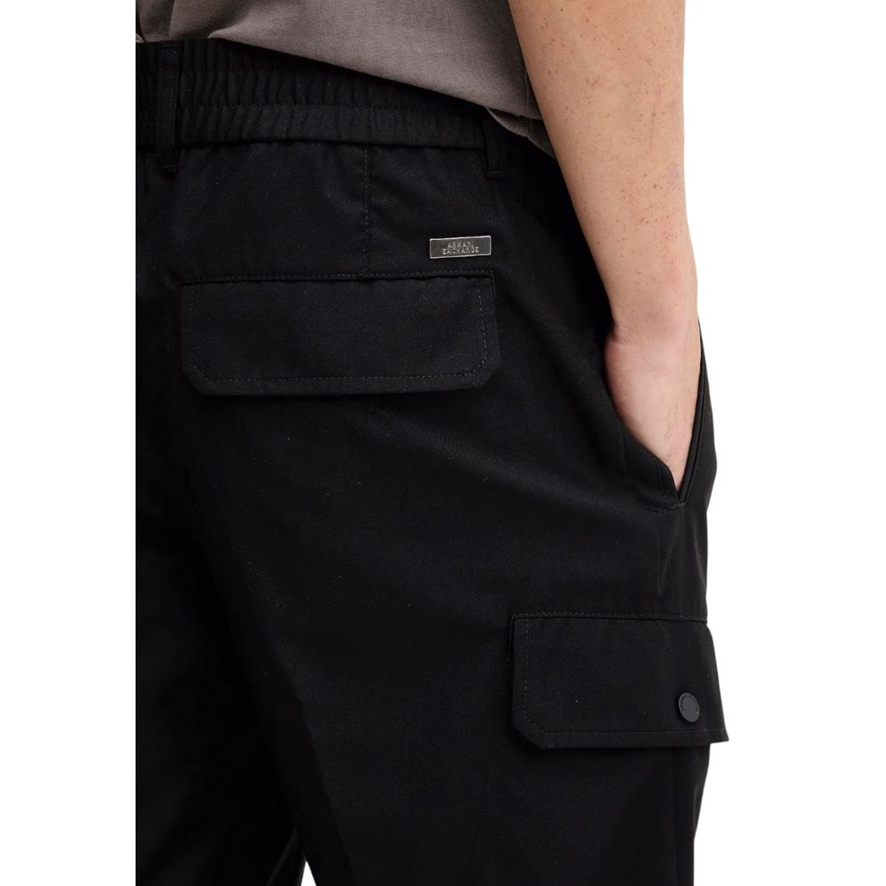 Trousers by Armani Exchange for men in polyester & viscose black presents a perennial silhouette, meticulously tailored with a regular-fit cut, long finish, and an elegant .