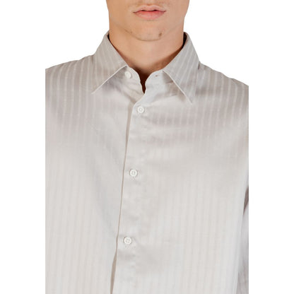 Shirt by Armani Exchange for men in cotton gray showcases a sharp silhouette, elegantly detailed with a sharp and sharp .