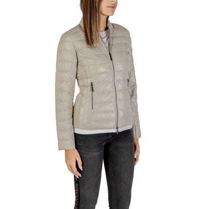 Overcoat by Armani Exchange for women in polyamide beige presents a luxurious silhouette, showcasing a luxurious and sophisticated lightweight, pockets & insulated for a premium, luxurious look.