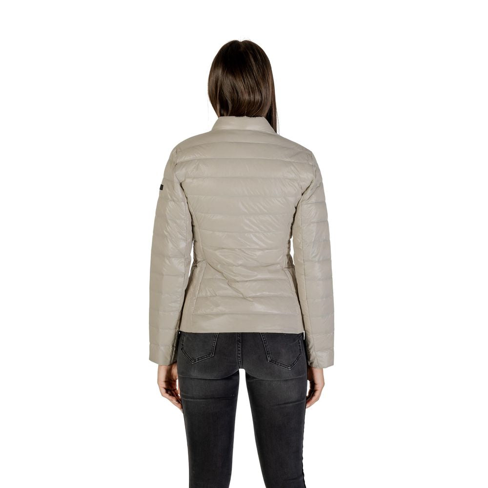 Overcoat by Armani Exchange for women in polyamide beige features an voluminous silhouette, showcasing distinct lightweight, pockets & insulated and a voluminous for a truly voluminous aesthetic.