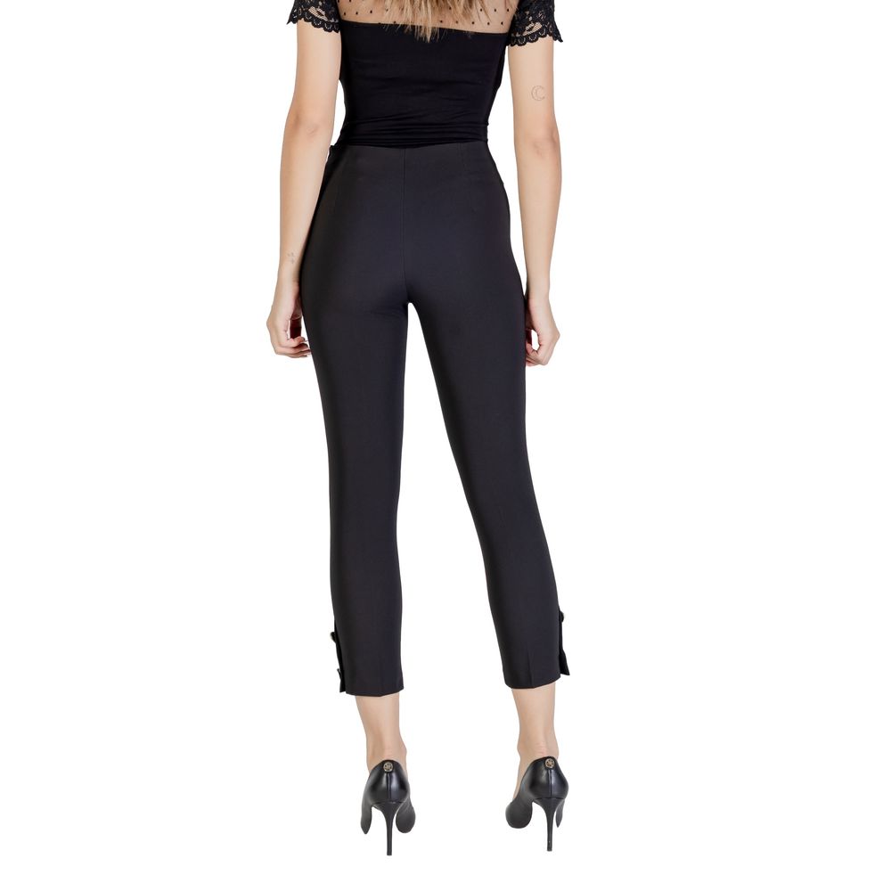 Trousers by Rinascimento for women in stretch polyester black features an on trend silhouette, showcasing a sophisticated cigarette with a long and high rise for an on trend finish.