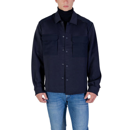 Shirt by Antony Morato for men in cotton polyester blue showcases a sleek silhouette, elegantly detailed with a sleek turtle neckline and long-sleeve for a sleek finish.
