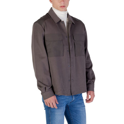 Shirt by Antony Morato for men in denim cotton green showcases a sharp silhouette, elegantly detailed with a sharp turtle neckline and sharp .