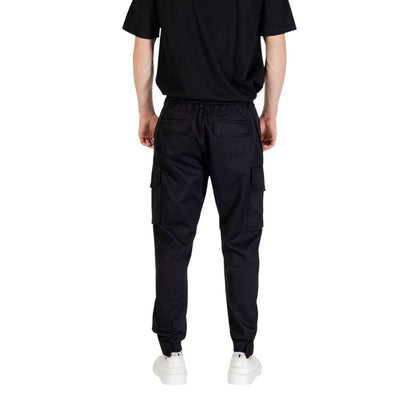 Trousers by Antony Morato for men in viscose cotton black presents a smart silhouette, meticulously detailed with a smart regular-fit, a smart long, and a smart .