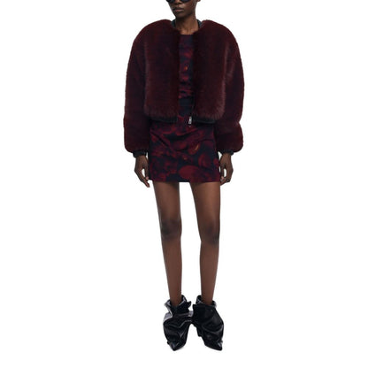 Jacket by Desigual for women in polyester faux fur bordeaux presents a authentic silhouette, artfully detailed with a authentic and functional for a premium authentic finish.