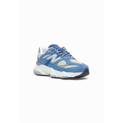 Sneakers by New Balance for women in synthetic blue presents a sumptuous silhouette, artfully capturing the essence of the Women's Lightweight Athletic Casual Synthetic Sneakers with its sumptuous athletic casual style design.