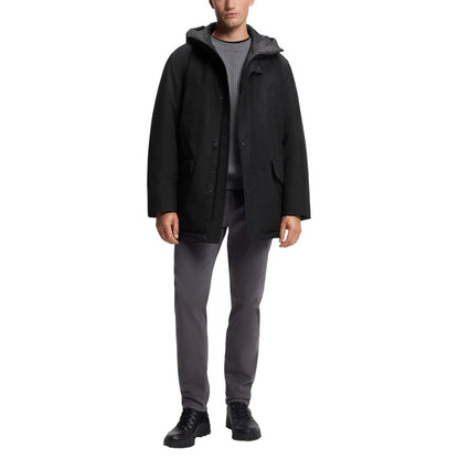This Hugo Boss men polyester Hooded Trench Coat in black presents a high style silhouette, meticulously detailed with pockets & hooded and a high style hooded neckline for a sophisticated, timeless look.