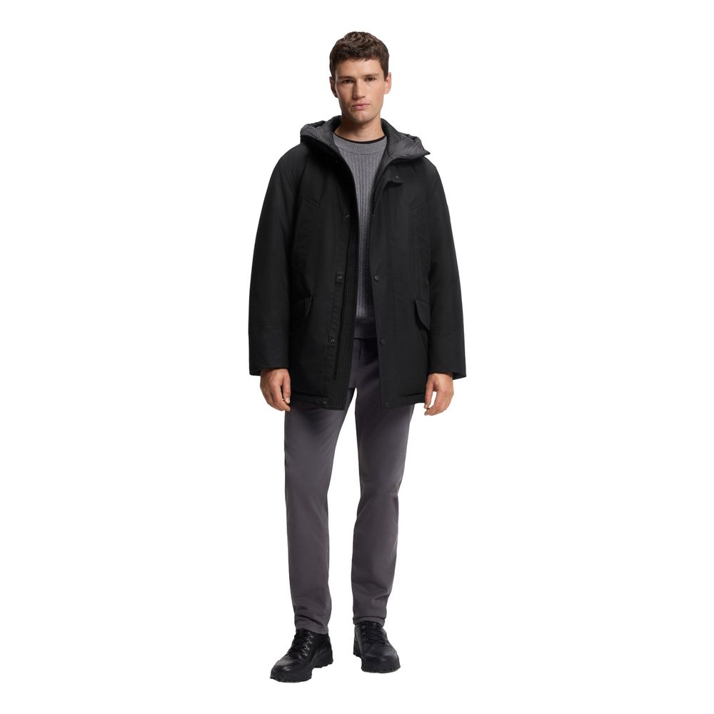 Hooded Trench Coat by Hugo Boss for men in polyester black showcases a contemporary silhouette, detailed with a contemporary and distinctive pockets & hooded for a truly contemporary finish.