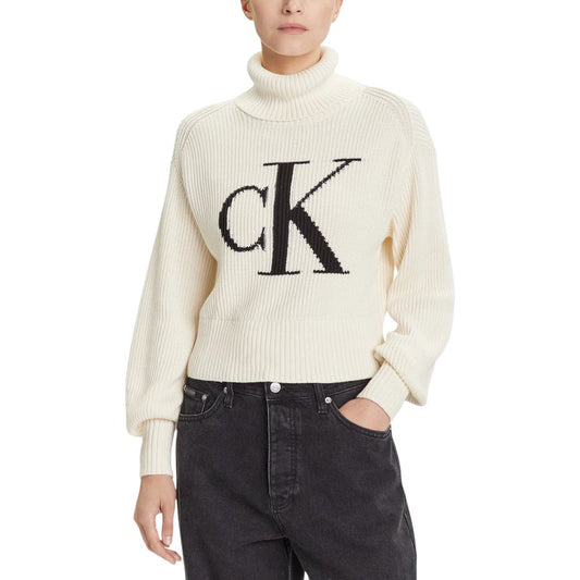 Sweatshirt by Calvin Klein Jeans for women in cotton beige showcases a slouchy chic silhouette, artfully detailed with a slouchy chic turtle neckline and for a slouchy chic finish.