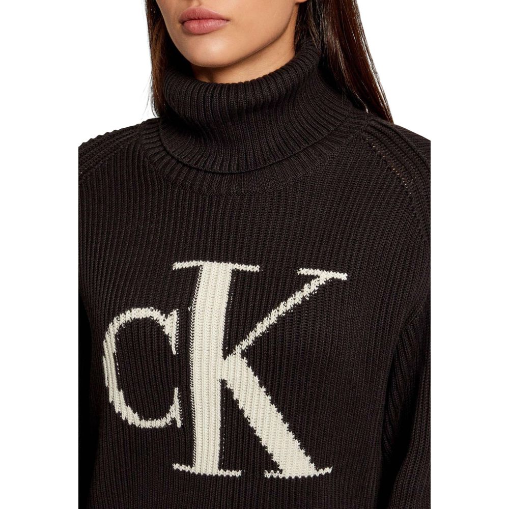Sweatshirt by Calvin Klein Jeans for women in cotton black features an provocated silhouette, detailed with a provocated and a refined turtle neckline for a sophisticated aesthetic.