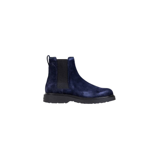 Flat Ankle Chelsea Combat Boots by Calvin Klein Jeans for men in suede leather blue features an performance-driven Men's Suede Leather Flat Ankle Chelsea Combat Boots silhouette, defined by a sophisticated flat and a performance-driven .