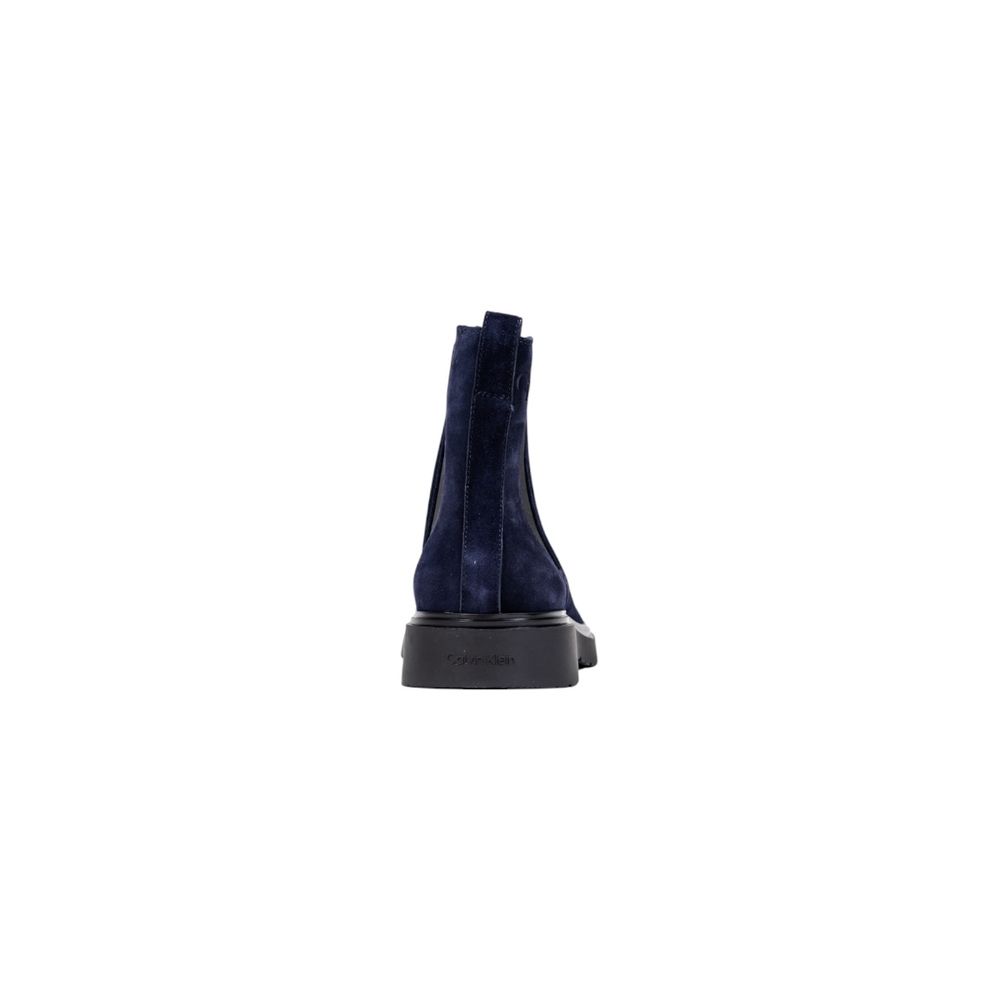 Flat Ankle Chelsea Combat Boots by Calvin Klein Jeans for men in suede leather blue features an dynamic silhouette, showcasing the dynamic Men's Suede Leather Flat Ankle Chelsea Combat Boots design with its distinctive flat and elegant .