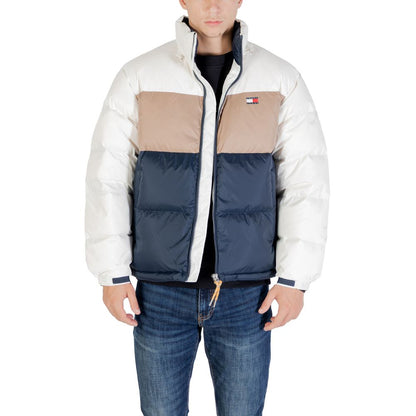 Bomber Jacket by Tommy Hilfiger Jeans for men in polyester cream features a dramatic silhouette, showcasing a sophisticated high-collar neckline and distinctive pockets for a dramatic aesthetic.