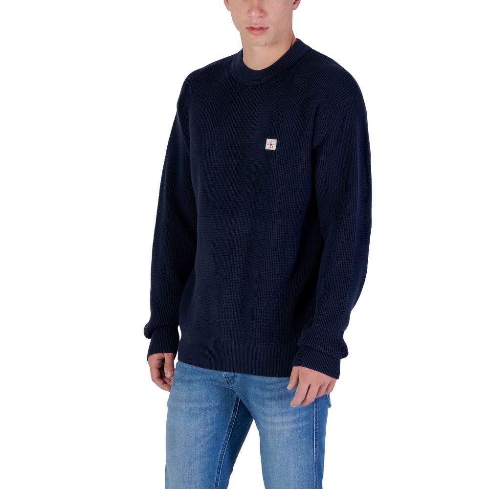 Sweatshirt by Calvin Klein Jeans for men in cotton blue presents a smart casual silhouette, featuring a smart casual and for a sophisticated look.