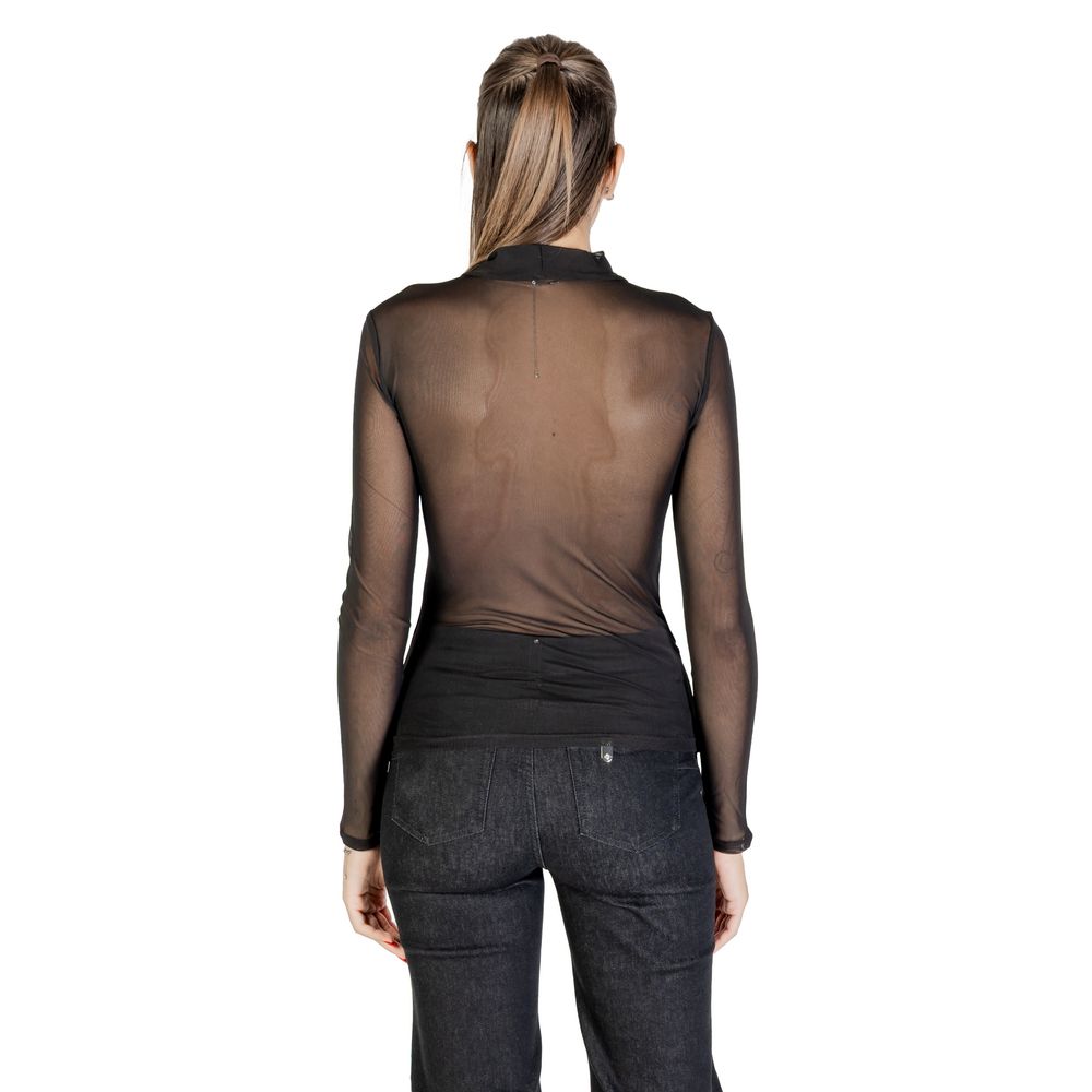 Shirt by Only for women in stretch polyester & lycra black presents a discerning silhouette, showcasing a sophisticated high-collar neckline and for a truly discerning finish.