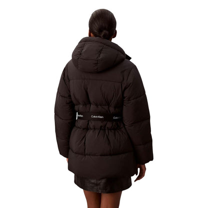 Hooded Overcoat by Calvin Klein Jeans for women in polyamide black features a cosy chic silhouette, artfully detailed with a sophisticated hooded neckline and premium lightweight, hooded & insulated for a cosy chic finish.