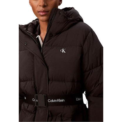 Hooded Overcoat by Calvin Klein Jeans for women in polyamide black showcases a architectural silhouette, artfully detailed with a distinctive hooded neckline and functional lightweight, hooded & insulated for a architectural finish.