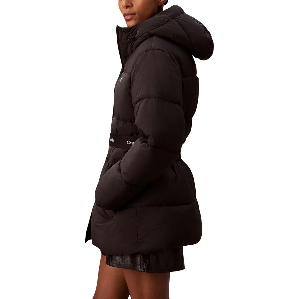 Hooded Overcoat by Calvin Klein Jeans for women in polyamide black features an satoral silhouette, showcasing a sophisticated and satoral lightweight, hooded & insulated for a premium, timeless look.