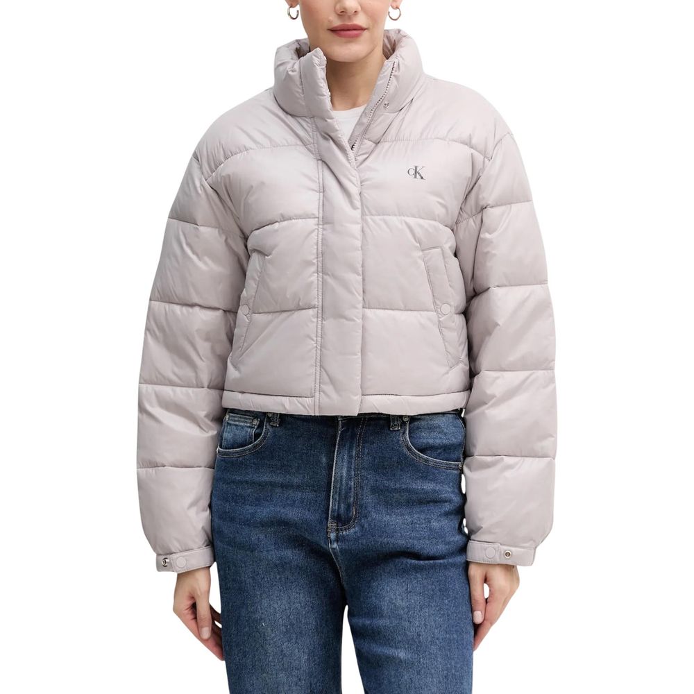 This Jacket by Calvin Klein Jeans for women in polyamide purple showcases a magnificent silhouette, meticulously crafted with a distinctive high-collar neckline and functional insulated for a magnificent finish.