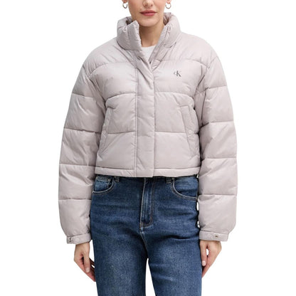 This Jacket by Calvin Klein Jeans for women in polyamide purple showcases a magnificent silhouette, meticulously crafted with a distinctive high-collar neckline and functional insulated for a magnificent finish.