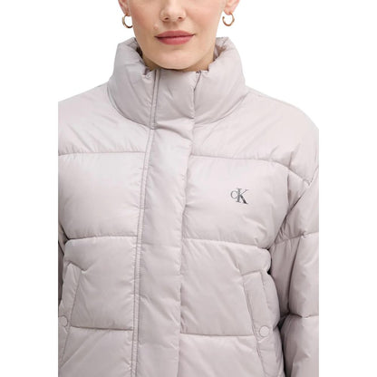 Jacket by Calvin Klein Jeans for women in polyamide purple presents a authentic silhouette, artfully detailed with a authentic high-collar neckline and functional insulated for a premium authentic finish.