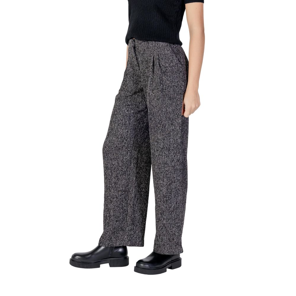 Trousers by Jacqueline De Yong for women in polyester & viscose black features an on trend silhouette, showcasing a sophisticated flared, bootcut, relaxed-fit & wide with a long and high rise for an on trend finish.