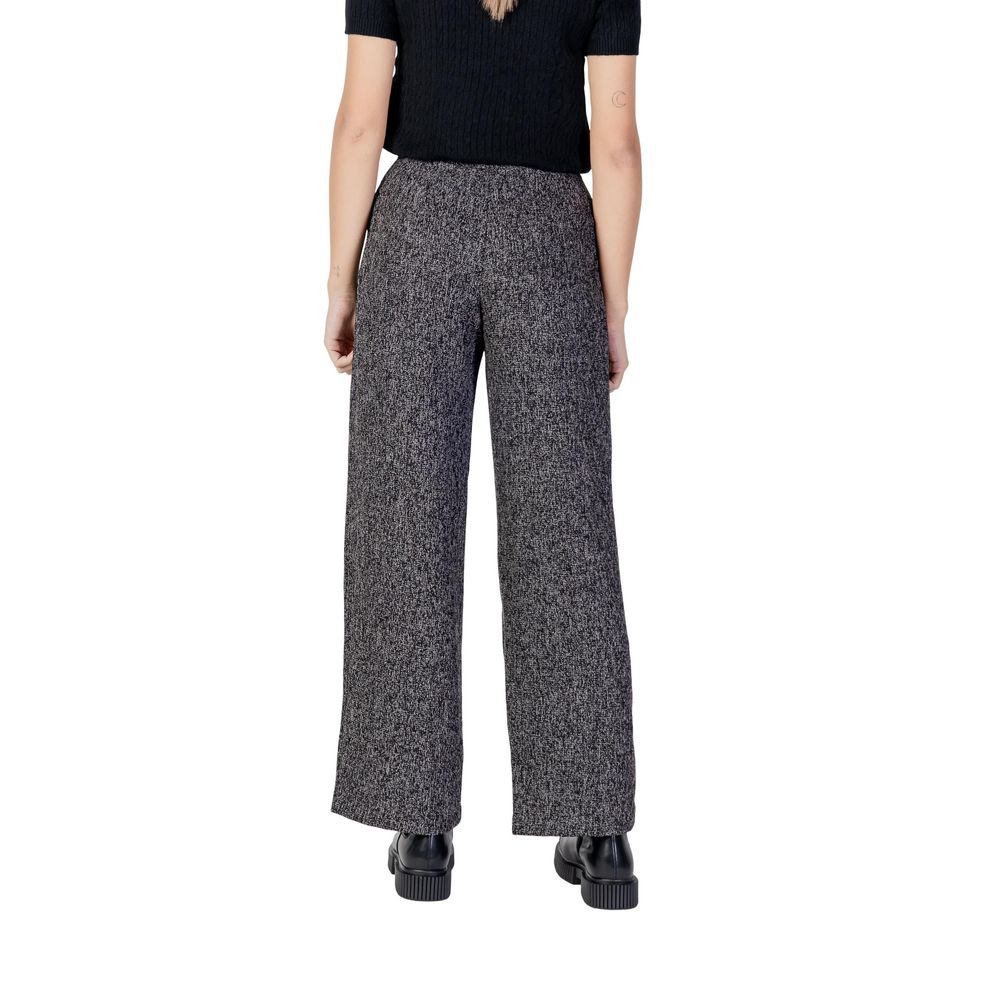 Trousers by Jacqueline De Yong for women in polyester & viscose black features a tailored silhouette with a tailored flared, bootcut, relaxed-fit & wide, defined by its long and a sophisticated high rise.
