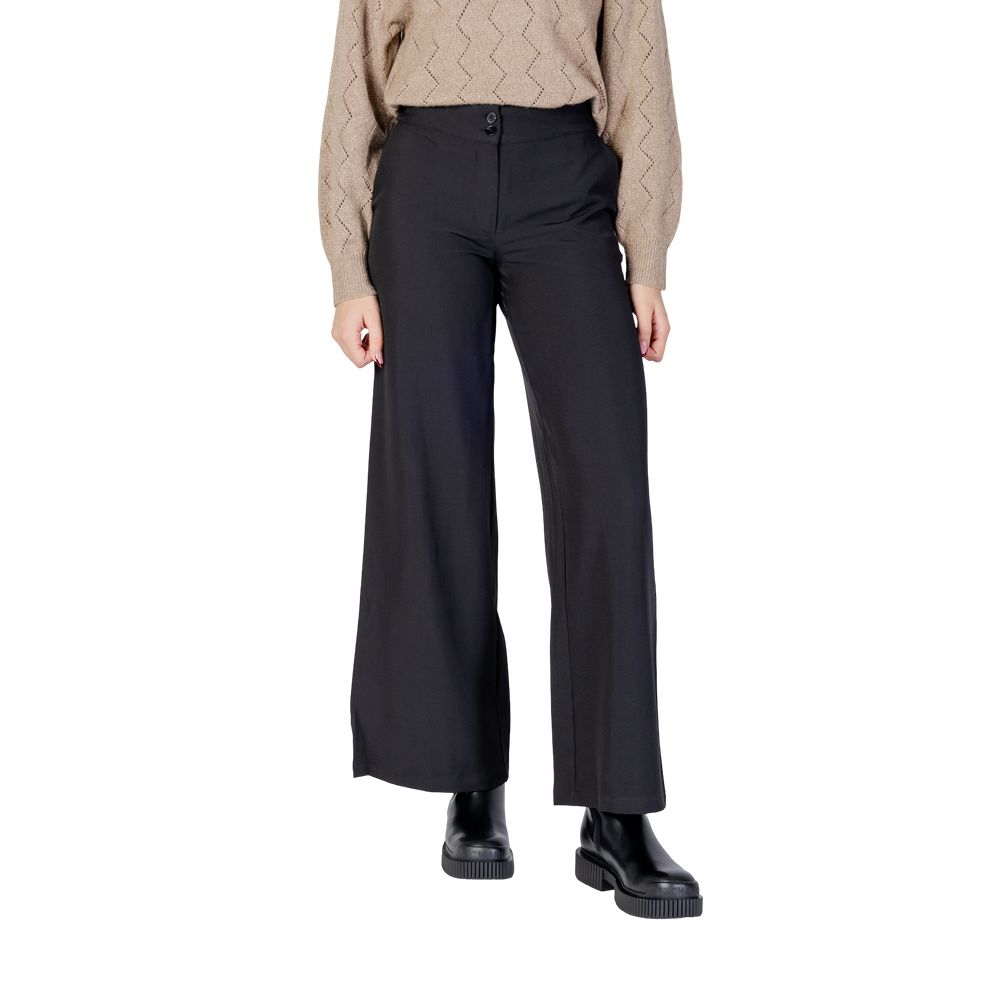 Trousers by Jacqueline De Yong for women in stretch polyester black features a sculptural silhouette, showcasing a sculptural flared, bootcut & wide and long with a sophisticated high rise for a sculptural finish.