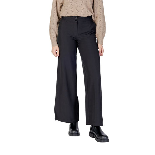 Trousers by Jacqueline De Yong for women in stretch polyester black features a sculptural silhouette, showcasing a sculptural flared, bootcut & wide and long with a sophisticated high rise for a sculptural finish.