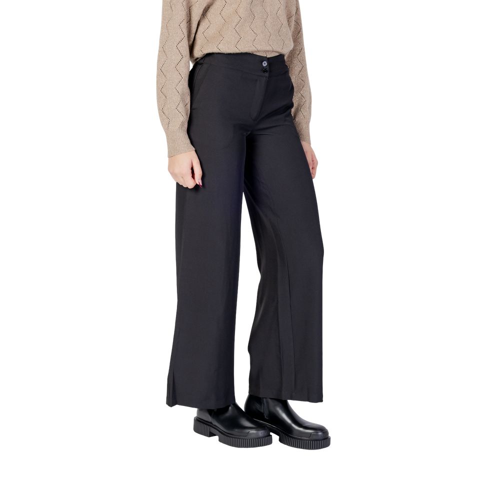 Trousers by Jacqueline De Yong for women in stretch polyester black features an sartorial silhouette, showcasing a precise flared, bootcut & wide and long with a sartorial high rise for a refined look.
