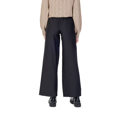 Trousers by Jacqueline De Yong for women in stretch polyester black presents a smart silhouette, meticulously detailed with a smart flared, bootcut & wide, a smart long, and a smart high rise.