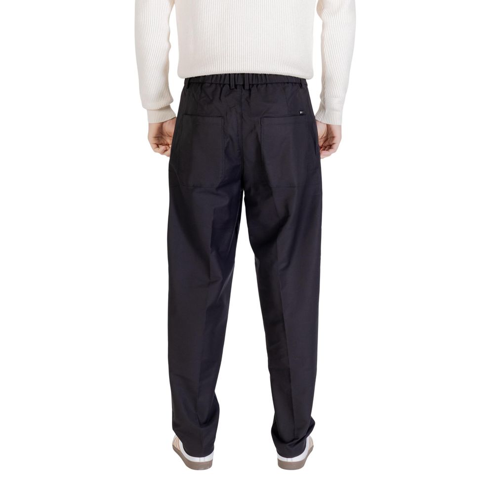 Trousers by Gianni Lupo for men in stretch polyester cotton black features a sculptural silhouette, showcasing a sculptural regular-fit and long with a sophisticated for a sculptural finish.