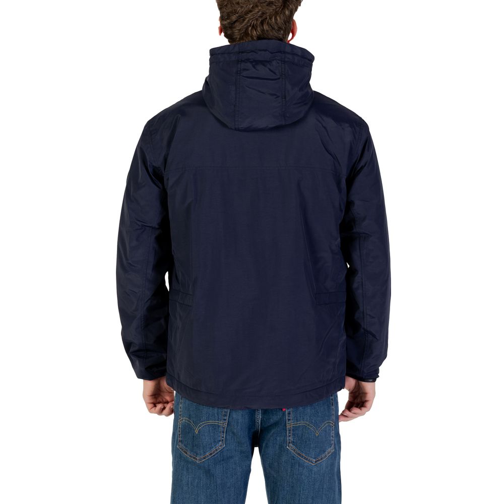 Hooded Windbreaker Jacket by Napapijri for men in polyamide blue showcases a modern silhouette, integrating pockets, hooded & windproof and a modern hooded neckline for a sophisticated finish.