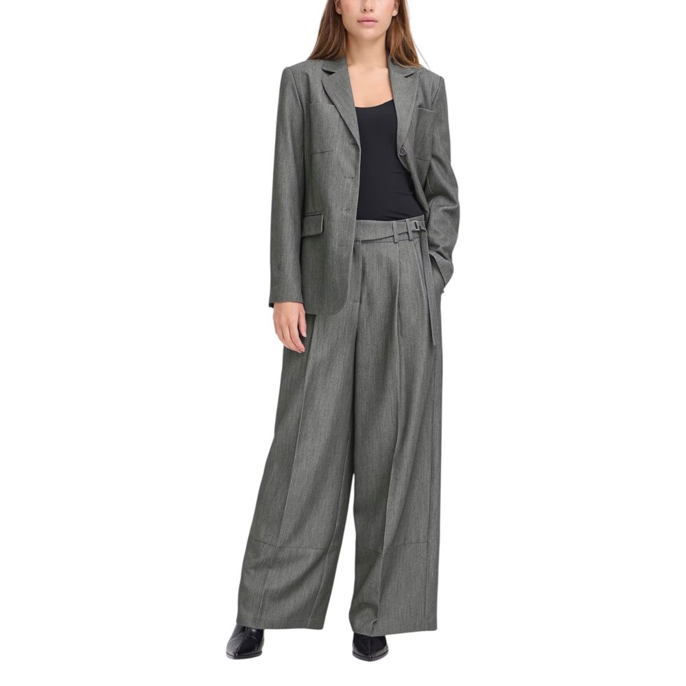 Trousers by ICHI for women in stretch polyester & viscose gray presents a perennial silhouette, meticulously tailored with a wide cut, long finish, and an elegant .