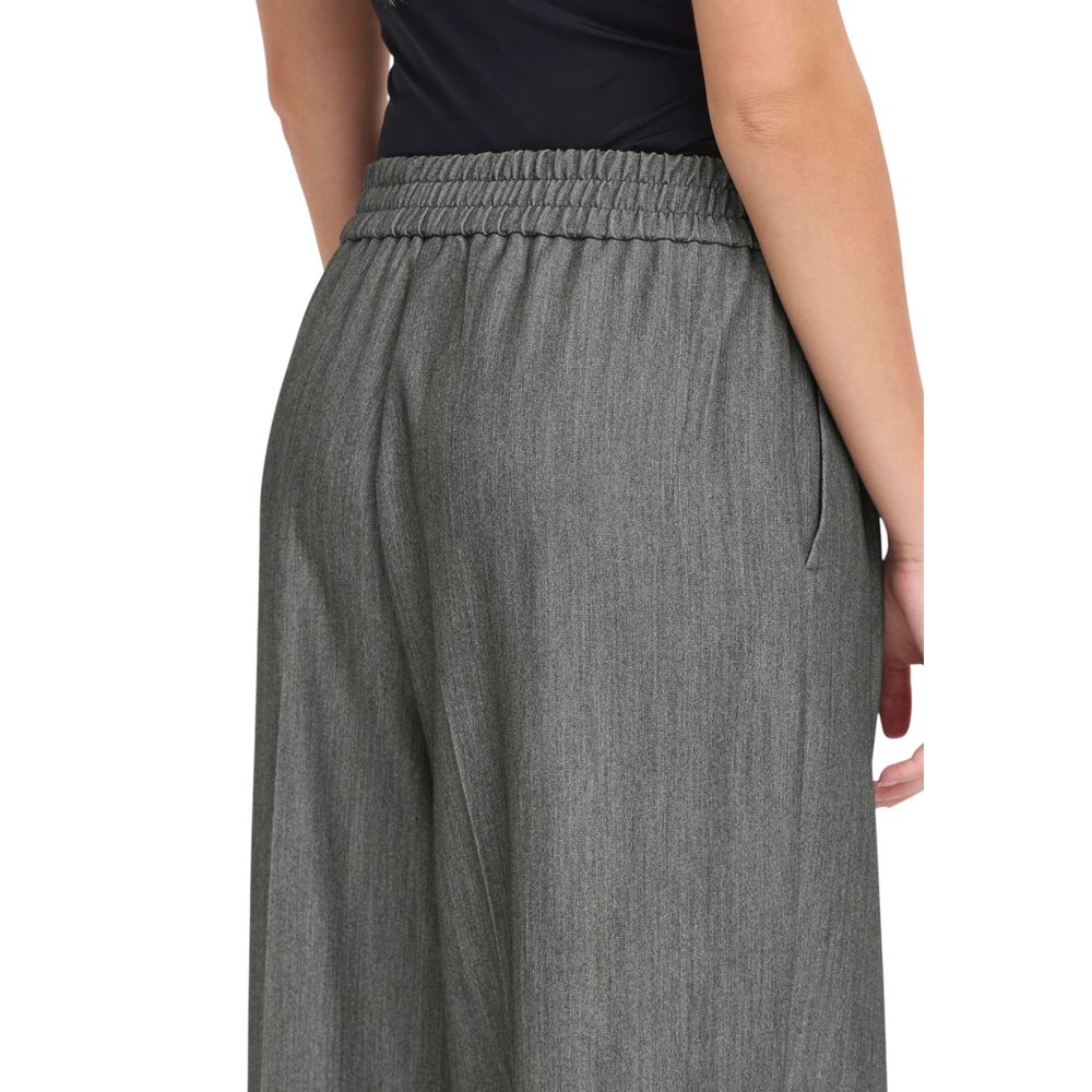 Trousers by ICHI for women in stretch polyester & viscose gray features an on trend silhouette, showcasing a sophisticated wide with a long and for an on trend finish.