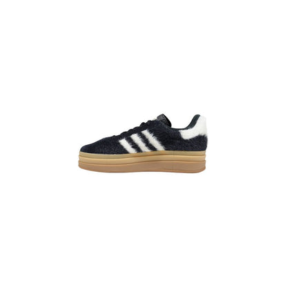 Sneakers by Adidas Originals for women in leather & rubber black & striped presents a sumptuous silhouette from the Women's Casual Leather & Rubber Sneakers collection, showcasing a sumptuous casual style for an elevated aesthetic.