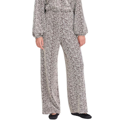 Trousers by ICHI for women in stretch polyester cotton animal & brown features a artisanal silhouette, showcasing a sophisticated wide with a long and high rise for a artisanal finish.