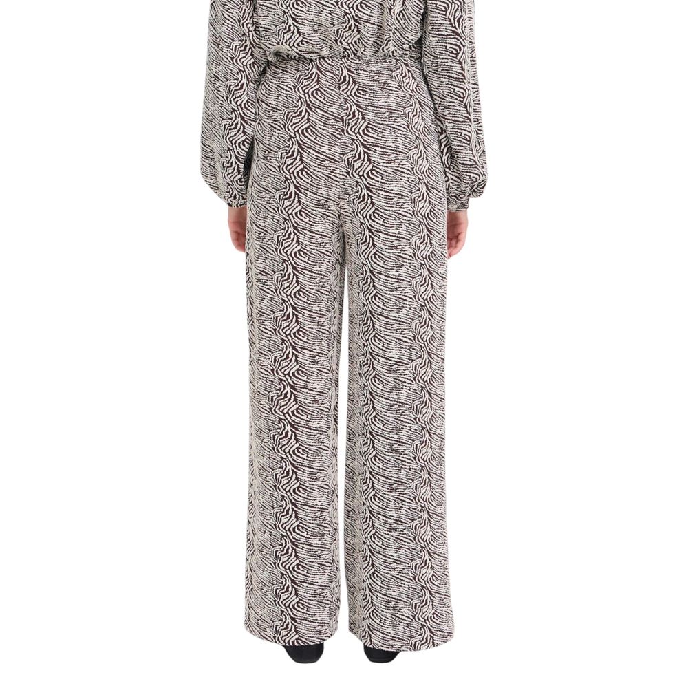 Trousers by ICHI for women in stretch polyester cotton animal & brown presents a smart silhouette, meticulously detailed with a smart wide, a smart long, and a smart high rise.
