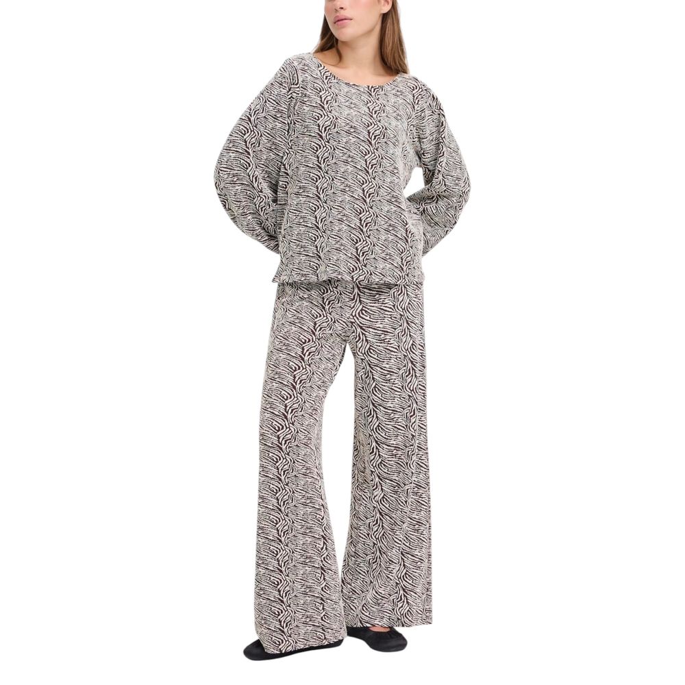 Trousers by ICHI for women in stretch polyester cotton animal & brown features a sculptural silhouette, showcasing a sculptural wide and long with a sophisticated high rise for a sculptural finish.