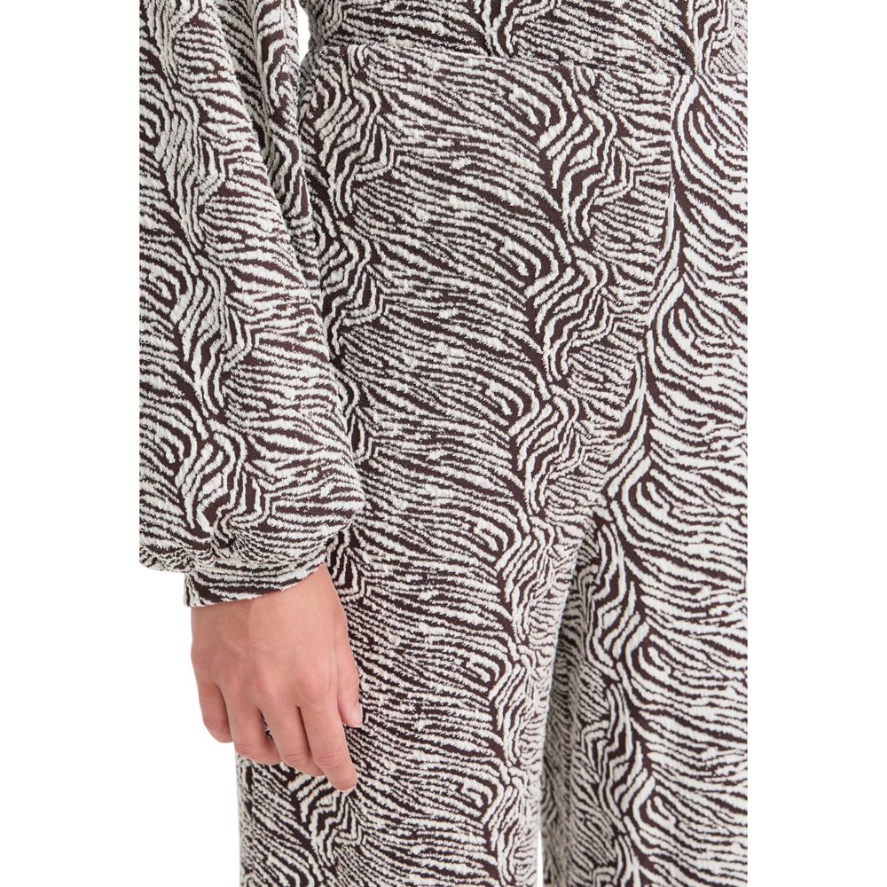 Trousers by ICHI for women in stretch polyester cotton animal & brown presents a smart silhouette, meticulously detailed with a smart wide, a smart long, and a smart high rise.