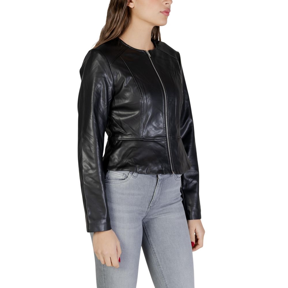 Jacket by Jacqueline De Yong for women in polyester polyurethane faux leather black presents a impeccable silhouette, showcasing distinct and a impeccable for a sophisticated finish.