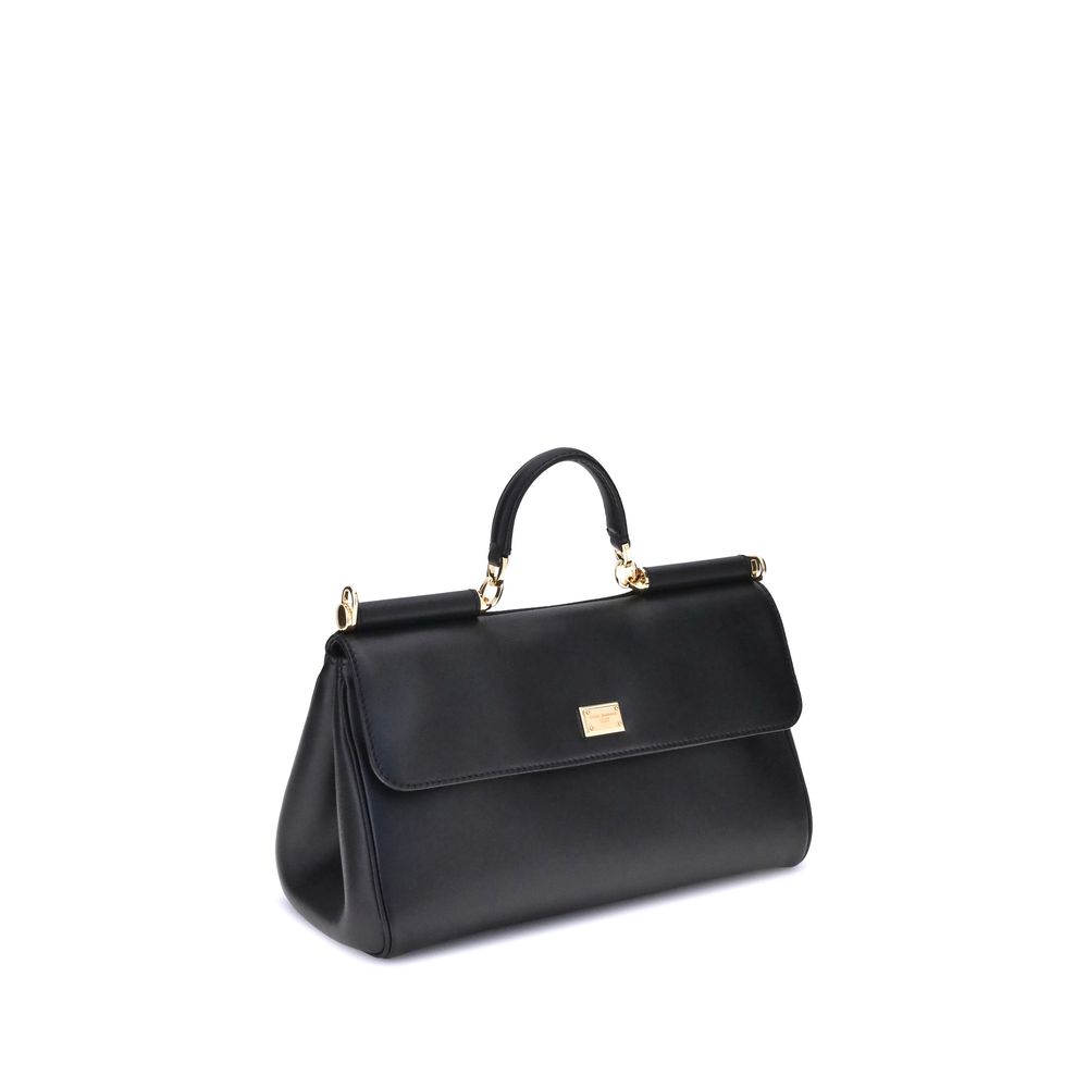 Flap Shoulder Bag by Dolce & Gabbana for women in bos taurus calf leather black & signature features a distinguished silhouette, showcasing a secure flap & magnetic and distinguished single-compartment with versatile shoulder-strap, handle & adjustable-strap for a distinguished finish.