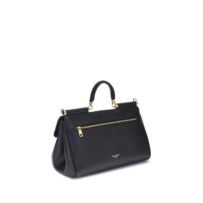 Flap Shoulder Bag by Dolce & Gabbana for women in bos taurus calf leather black & signature features a enviable silhouette, showcasing a secure flap & magnetic, ample single-compartment, and enviable shoulder-strap, handle & adjustable-strap for a enviable finish.